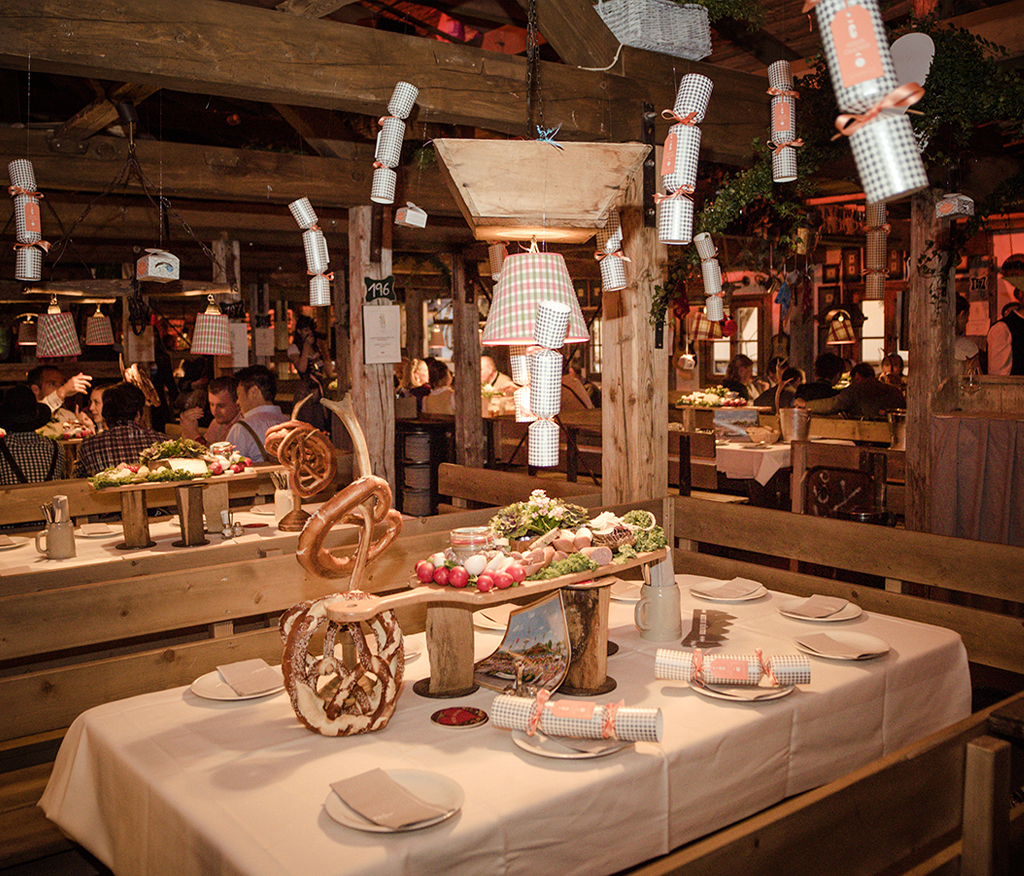 Decorated Oktoberfest tent by Käfer with merchandising, which was realized by our creative agency.